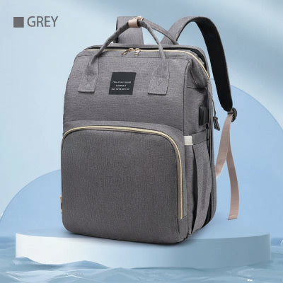 Sac-à-dos-à-langer-gris-bretelles-fermeture-glissière