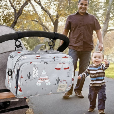 sac-a-langer-cactus-attaches-poussette-papa-bébé-sourire-parc