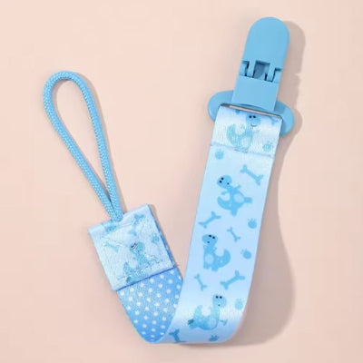 Attache tetine en silicone bleu design dinosaure 
