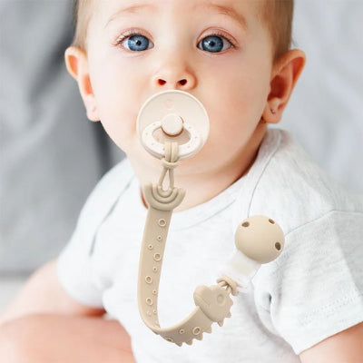 Attache tetine motif girafe beige bébé yeux bleu