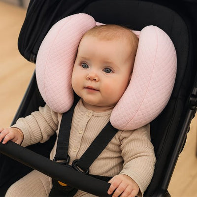 bébé dans sa poussette avec Cale tete bebe Rose