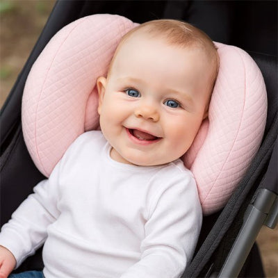 bébé souriant Cale tete bebe Rose autour de sa tête