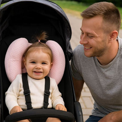 papa et fillette souriante dans poussette avec Cale tete bebe Rose