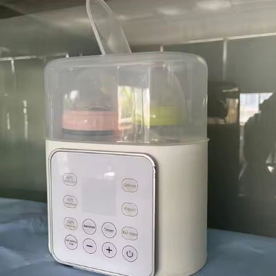 Chauffe biberon ultra-rapide couvercle interface numérique