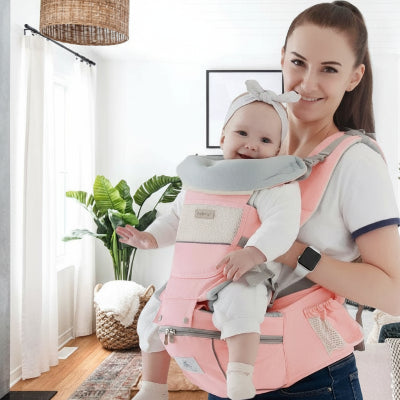 porte bébé physiologique rose confortable pour un portage ventral avec maman 