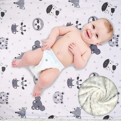 couverture-bebe-polaire-nestconfort-animaux-gris-bébé-sourire