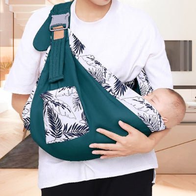 Écharpe de portage vert bébé confortablement endormi