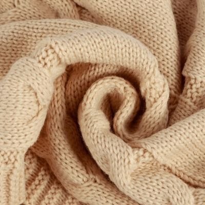 nid-d-ange-beige-tissu-tricot
