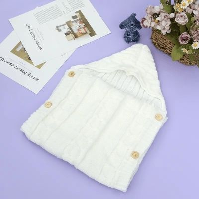nid-d-ange-tricot-blanc-modele