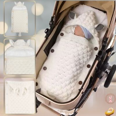 nid-d-ange-cosy-blanc-poussette-boutons-bois-brun