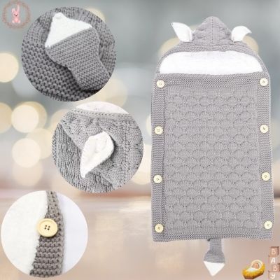 nid-d-ange-cosy-gris-clair-tricot-queue-oreille-lapin