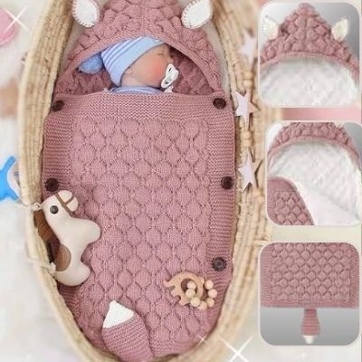 nid-dange-cosy-rose-fonce-bebe-dodo-enveloppant-boutons-bois