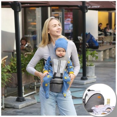 porte bebe gris bébé chapeau bleu souriant