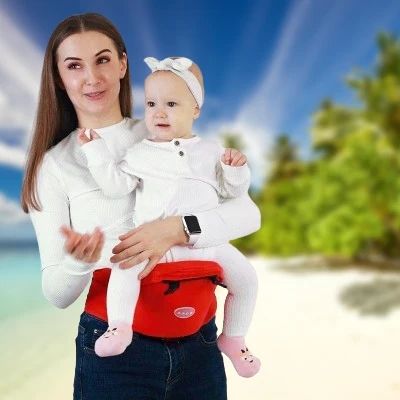 porte-bébé-rouge-tabouret-lombaire-bébé-sourire