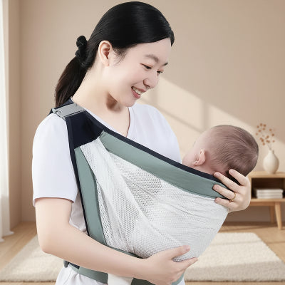 porte-bebe-vert-avocat-bebe-sourire-bretelles-epaules