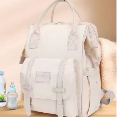 Sac-à-langer-à-dos-beige-biberons-pochette-avant