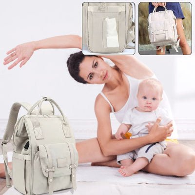 sac-à-langer-à-dos-gris-bretelles-bébé-assis-sur-les cuisses de maman