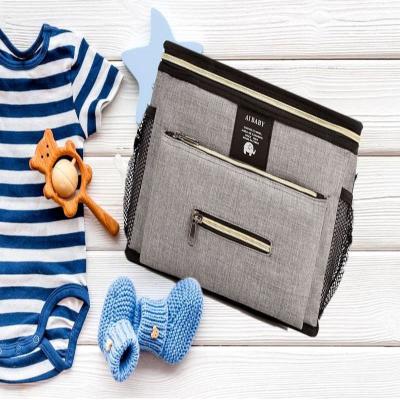 sac-a-langer-gris-chaussette-tricot-bébé-bleu
