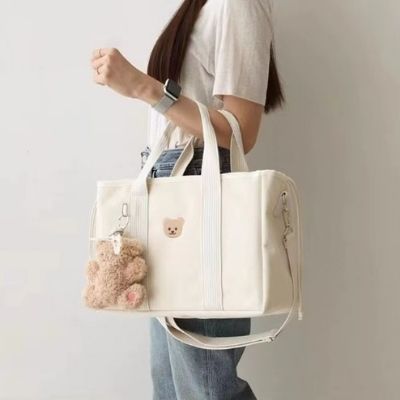 sac-a-langer-bretelles-beige-ours-brun-montre
