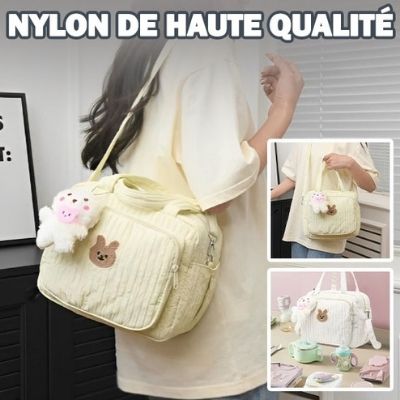 Sac-à-langer-peluche-ours-rose-biberon-lingettes-portage-épaule